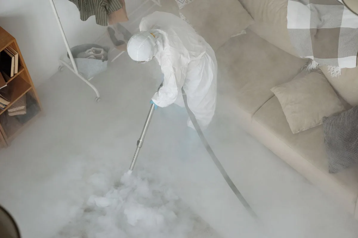 Biohazard cleanup technician in protective equipment, Penngrove, CA